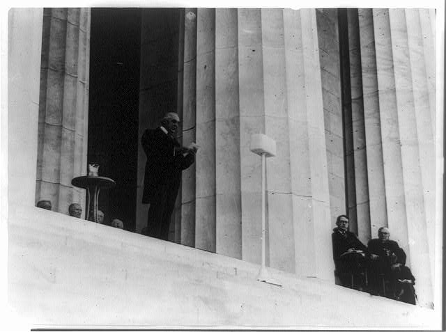 [President Warren G. Harding making speech from top of...