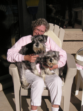 Janet Arlia & two of her miniature schnauzer dogs in Chandler AZ.