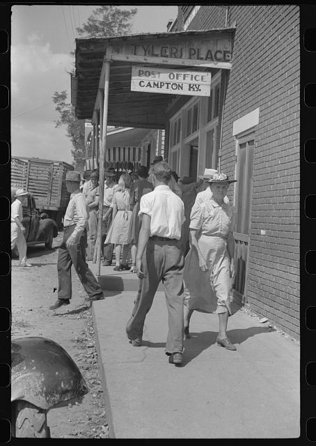 Farmers and townspeole on "Jockey Street" in Campton,...