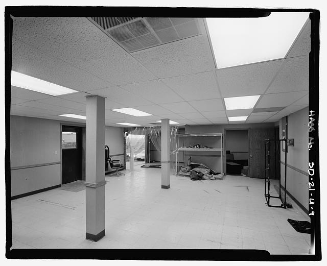9. Interior view of unoccupied space; showing opened...