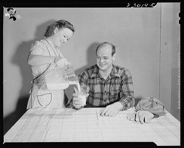 Bridgeton, New Jersey. Seabrook Farm. Man drinking milk