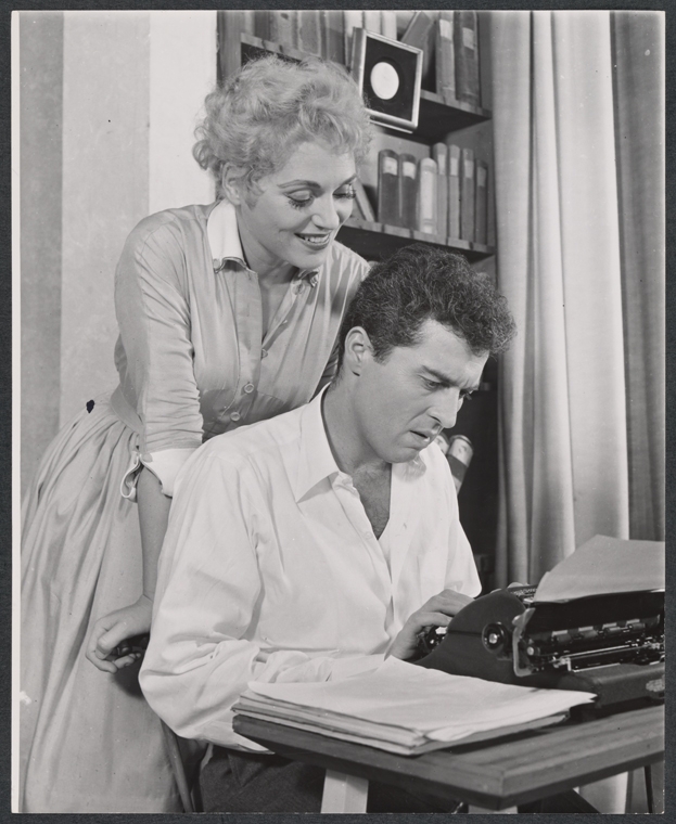 Judy Holliday and Sydney Chaplin