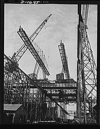 Shipbuilding (Newport News). Huge overhead cranes are...