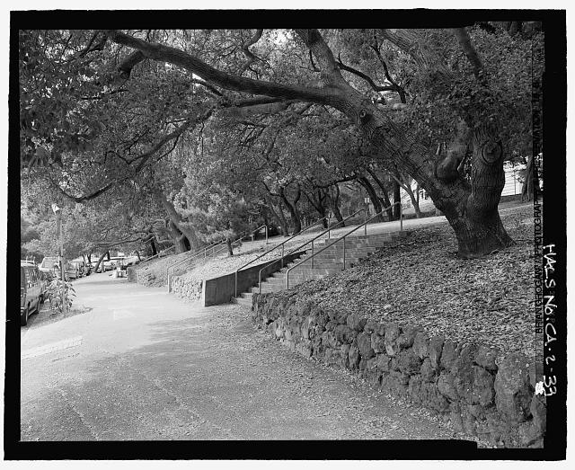 DETAIL VIEW OF SIDEWALK AND STONE WALL EAST SIDE OF...