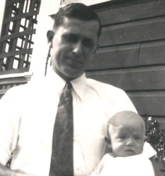 Clarence Ackerman with child
