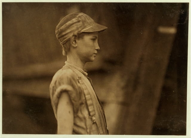 One of the young doffers in Avondale Mills. Location:...