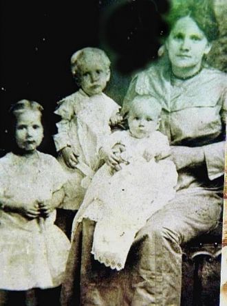 Lucy Ansorge Edelman with babies
