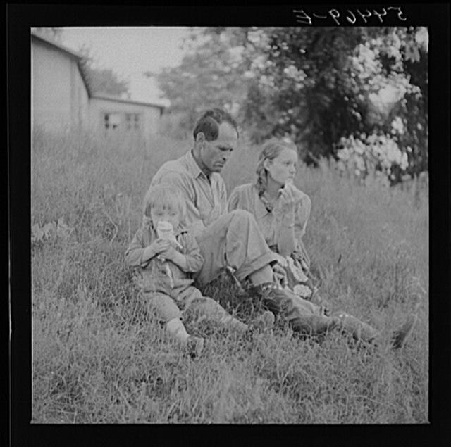 Farm family having fish fry along Cane River on Fourth of...