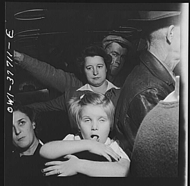 Passengers on a Greyhound bus going from Chicago,...