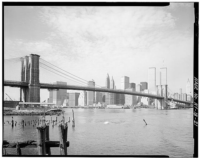 21. View looking W from Brooklyn shore with pier pilings...