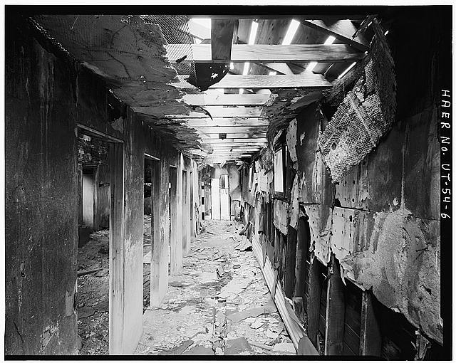6. INTERIOR VIEW OF BATHHOUSE SNOWING SHOWER STALLS,...