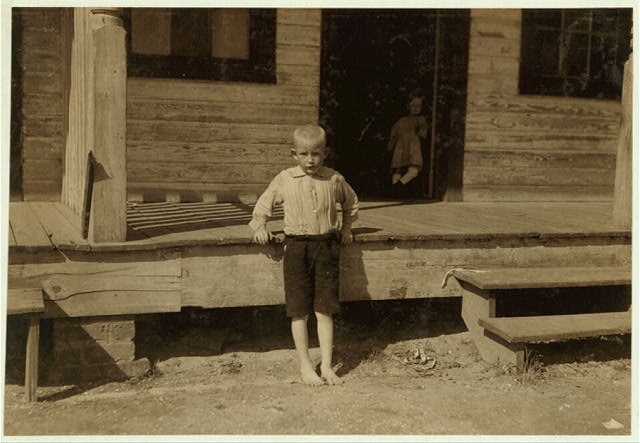Bill May, a bright, freckled five year old, who works in...