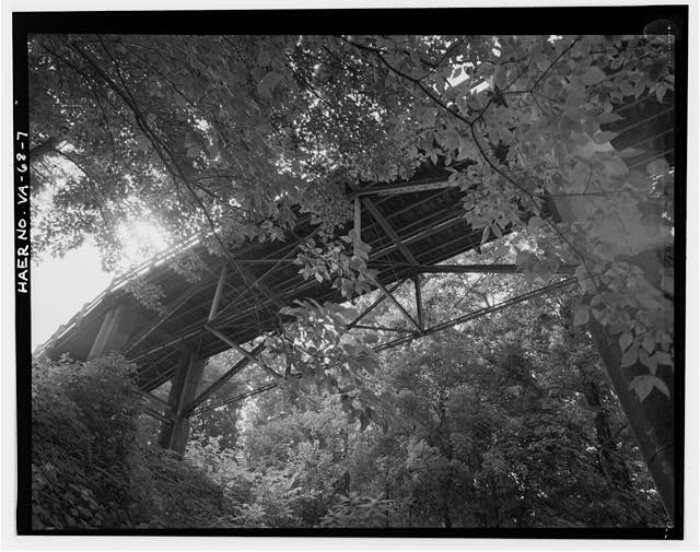 7. VIEW NORTH OF UNDERSIDE OF PRATT DECK TRUSS - New...