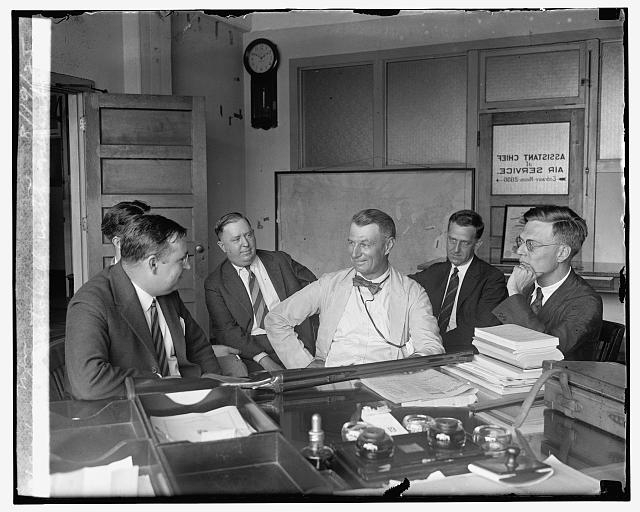 Col. Mitchell with newspapermen, 8/19/25