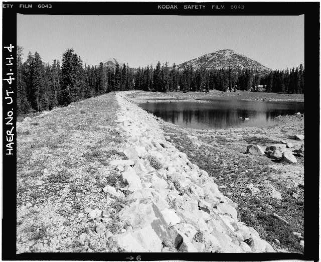 4. VIEW OF CREST AND UPSTREAM FACE OF DAM, LOOKING NORTH...