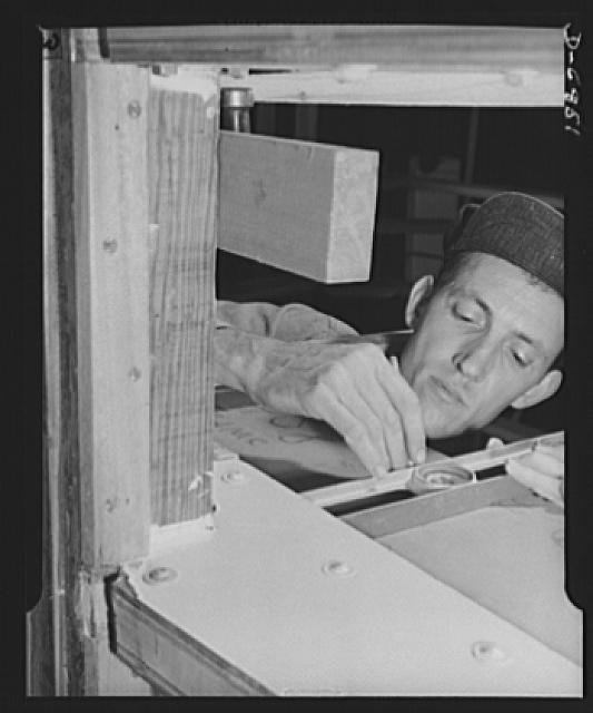 Production. Motor torpedo boats (wooden). A carpenter at...