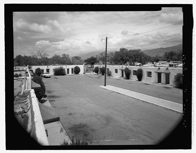 General view of complex from roof at far southwest...