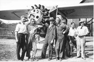 Men with Plane at Mitchell Field
