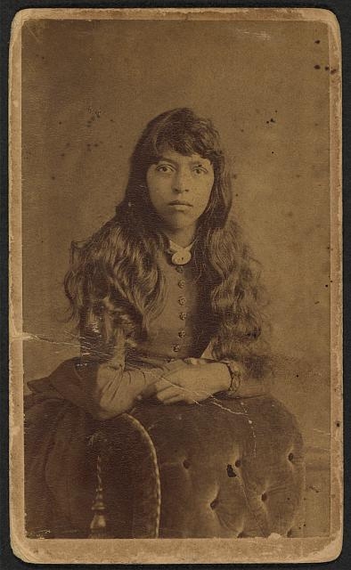 [Three-quarter-length portrait of an unidentified woman...