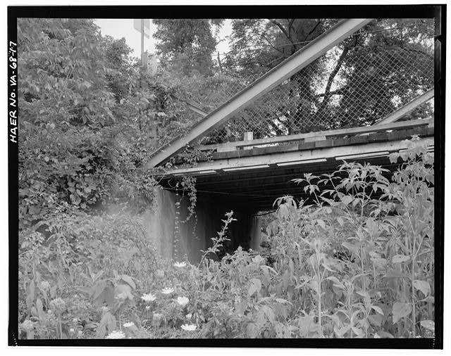 17. CONCRETE ABUTMENT AT EAST END OF BRIDGE, VIEW SOUTH -...