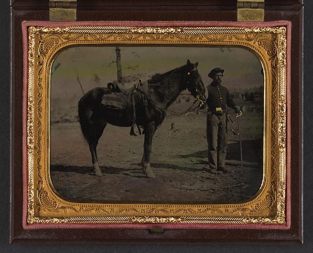 [Unidentified soldier in Union uniform with saber and horse]