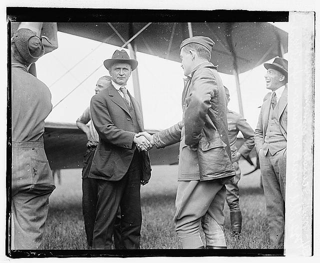 Maj. Scanlon, Commander at Bolling field, greets Mr....