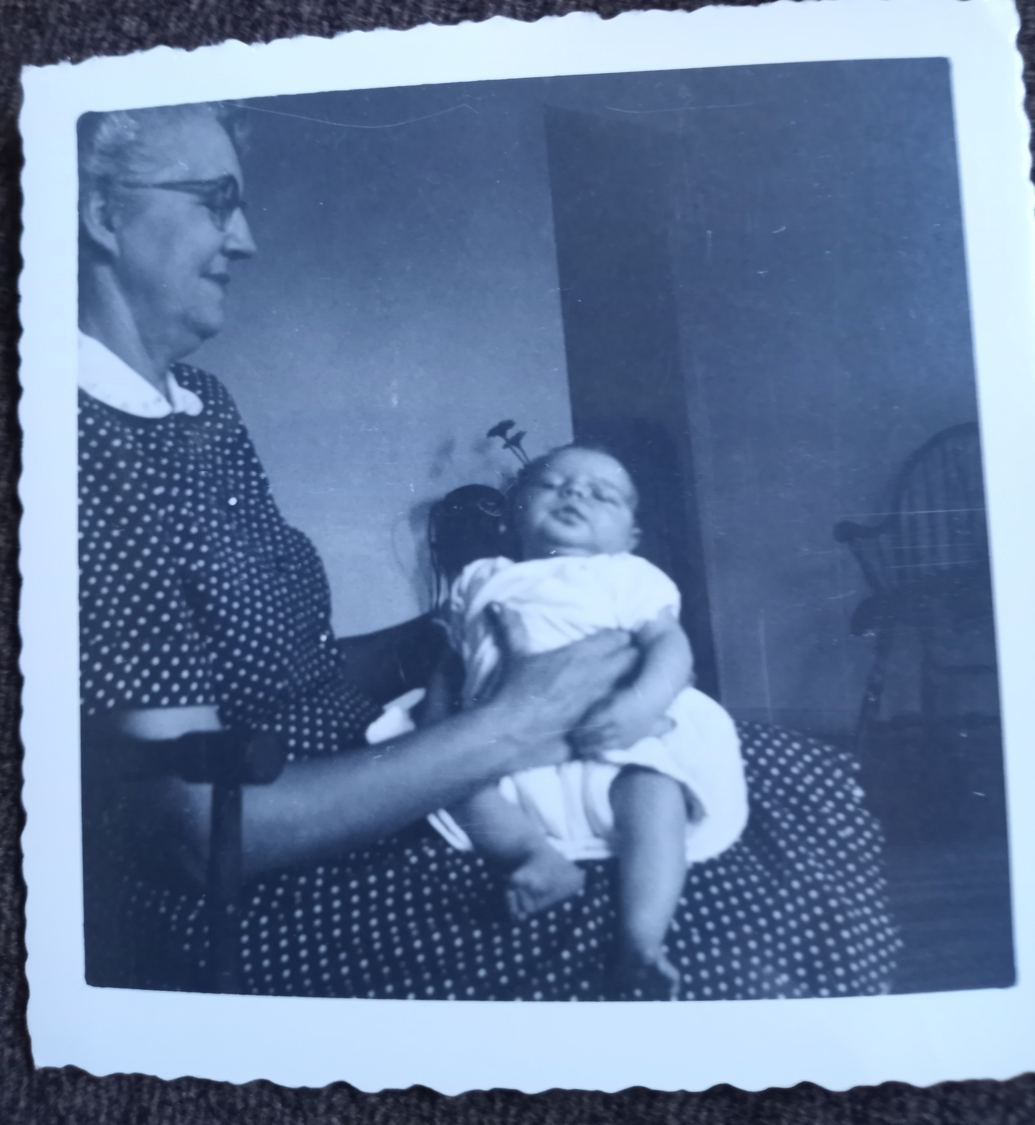 Ida Ruth McDonald holding her grandson. Theorde George McDonald. 