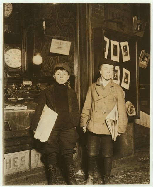 Newsies selling at 10 P.M. Boy on left: Joseph Mandi, 11...