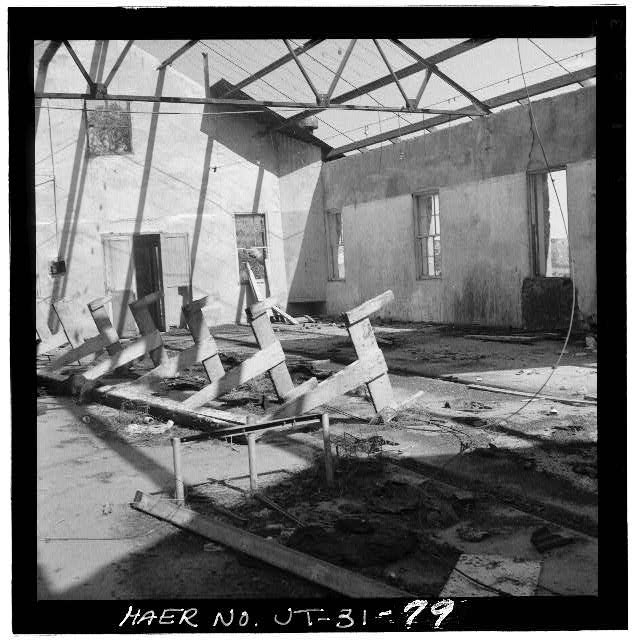 79. THIS ROOM WAS ONCE LINED WITH BENCHES AND PIPE...