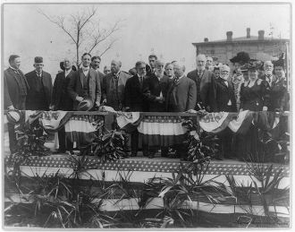 [Andrew Carnegie and other dignitaries on the platform at...