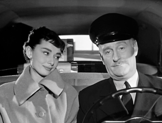 Audrey Hepburn and John Williams in Sabrina.