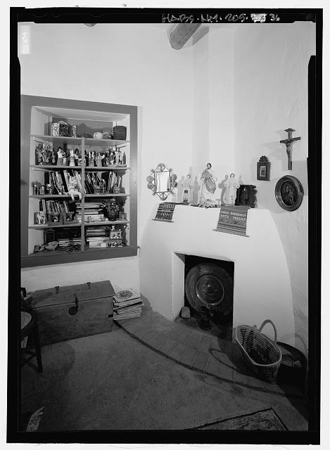 Detail view of fireplace in northwest corner of...