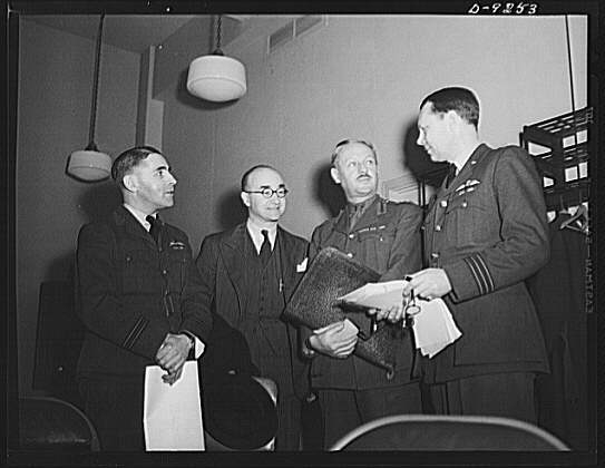 Combined Munitions Assignments Board. Staff members of...