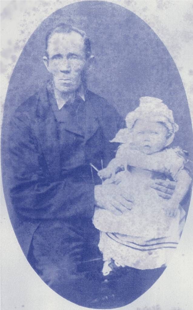 English Gentleman holding Baby