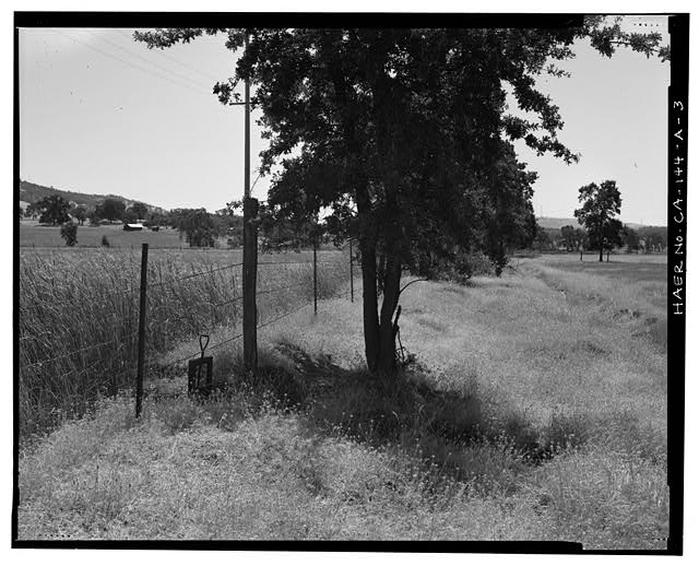3. Earthen berm and water control structure used to...
