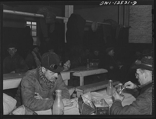 Chicago, Illinois. Railroad workmen having lunch in their...