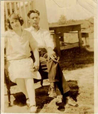OLIVER AND FLOSSIE DEFORGE IN YARD