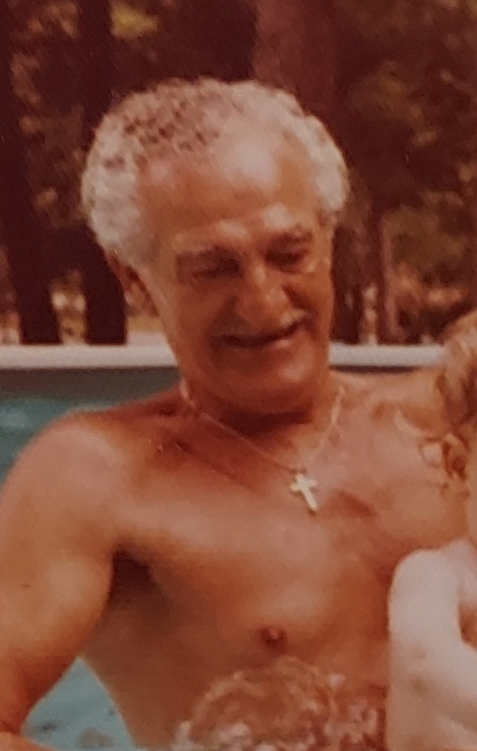 Nonno swimming with grandson.