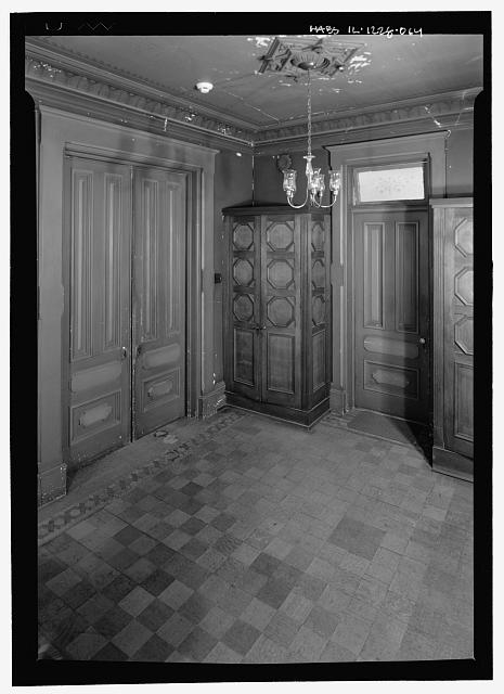 Second floor, hallway, middle hall, pocket doors, and...