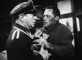 Sig Ruman and William Holden