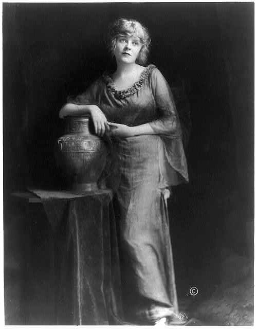[Blanche Sweet, full length, standing, right arm on vase,...