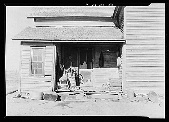 Backporch of farmhouse on J.H. and Ellis Cline's one...
