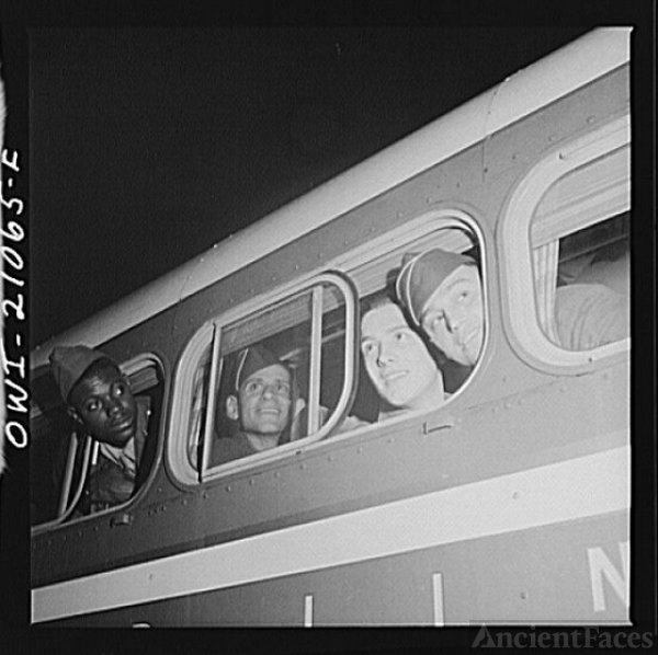 Washington, D.C. Soldiers looking out the window of the...