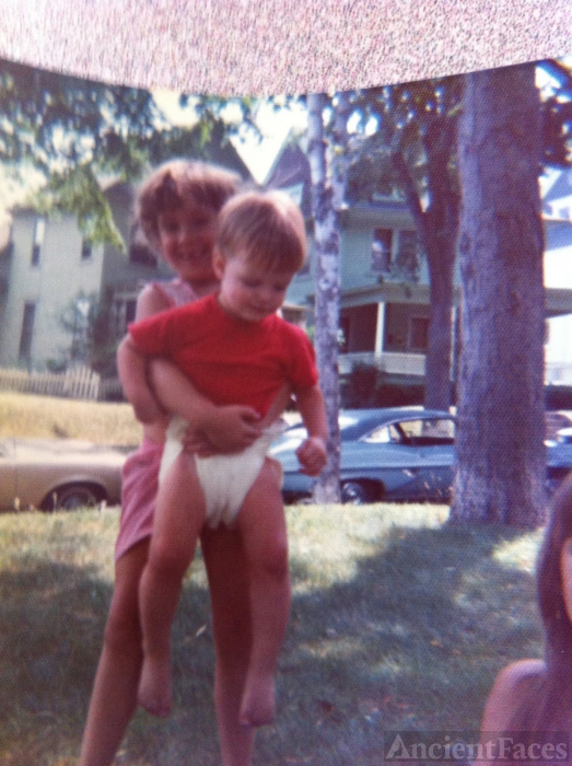 Me holding a cousin.
