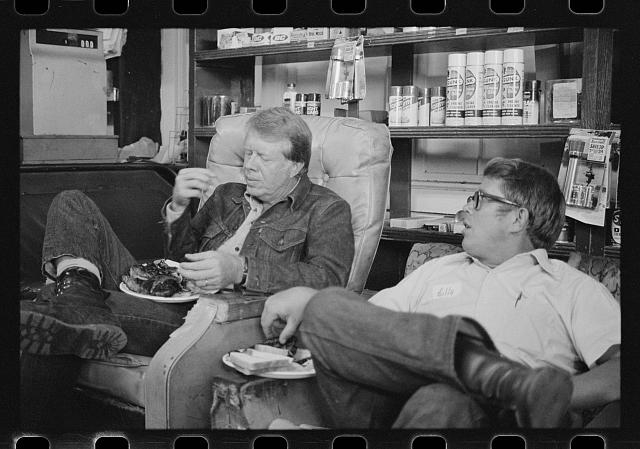 [Jimmy Carter eats with his brother, Billy Carter, during...