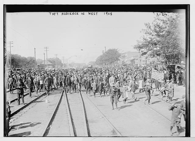 Taft crowd on railroad tracks in West