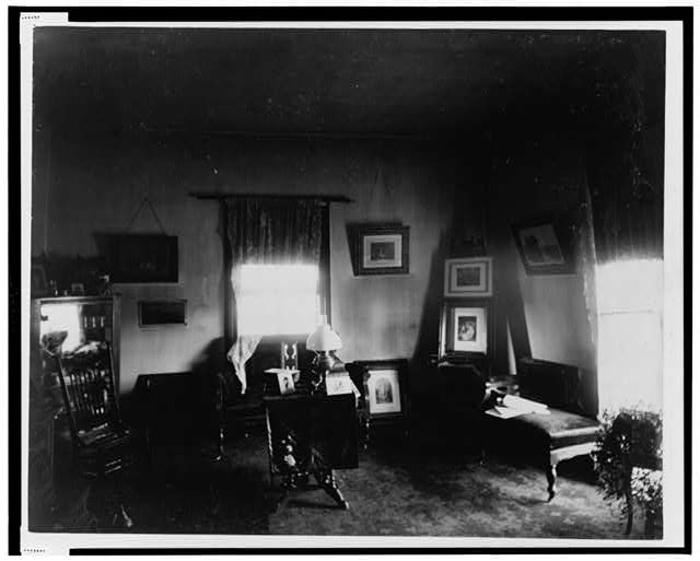 [Interior view of room showing furniture and framed...