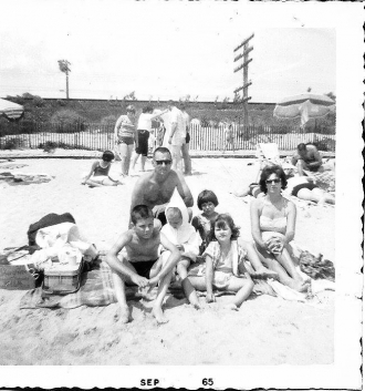Henry and Bernadette Blaney Gingras and their children on the beach