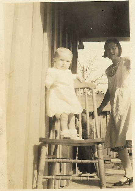 Helen Irene Graham standing on a chair 1931 abt a year old