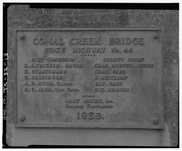 13. BUILDERS' PLATE AT SE END OF BRIDGE. - Comal Creek...
